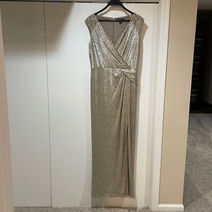 Full length, lined, front kick slit, side gather, beads on shoulders